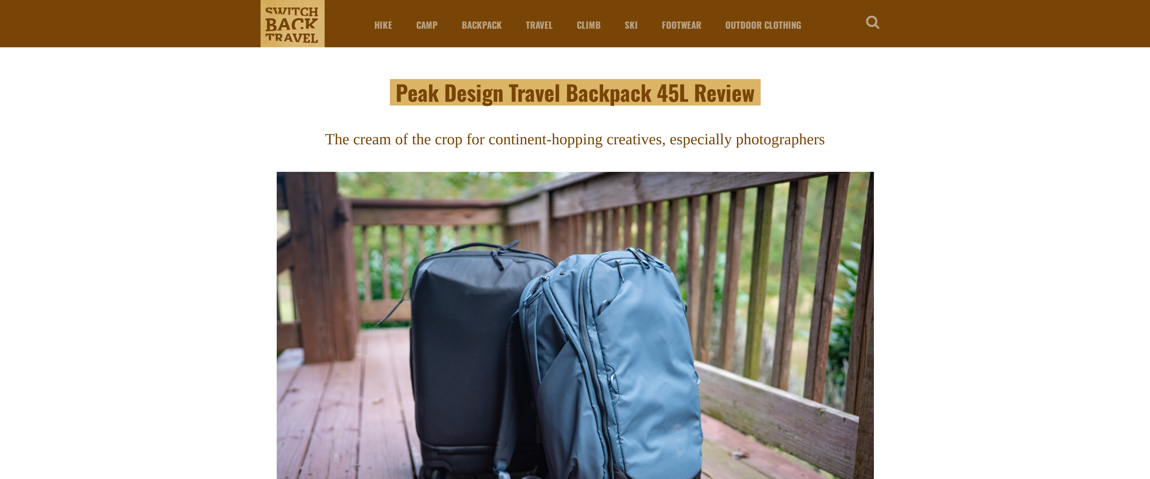 Switchback Travel's long-term review of the Peak Design Travel Backpack leaning against a carry-on suitcase